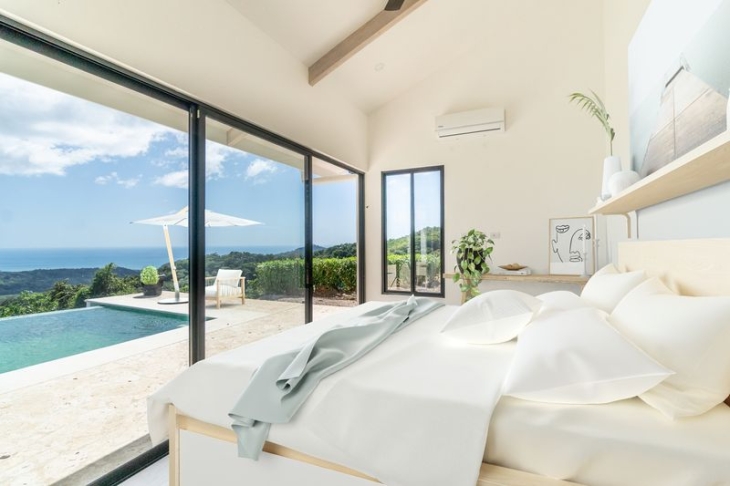 guest bedroom with ocean view at Casa Blanca home luxury home for sale samara costa rica