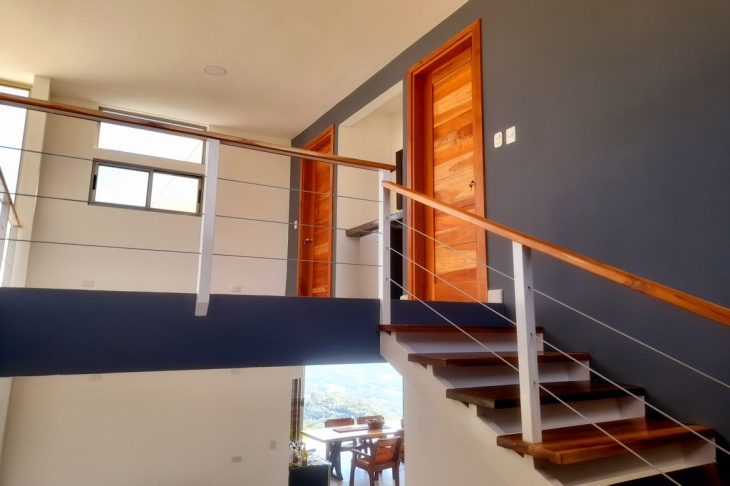 nice wooden staircases in Casa Ying Yang high-end home for sale samara costa rica