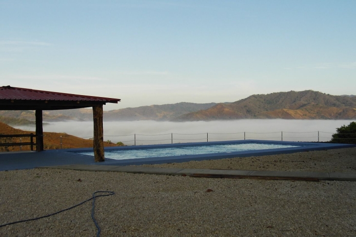 pool area of Finca Las Nubes home and land for sale samara guanacaste costa rica