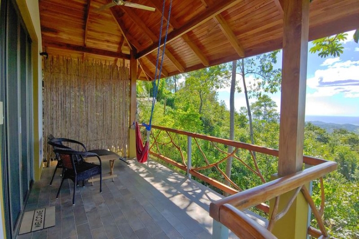 balcony with ocean view at Moutain Lodge vista Mar hotel for sale samara costa rica