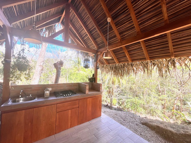 covered deck with kitchen in Casa Dragonfly home for sale samara costa rica