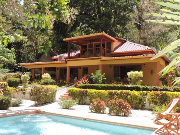 front view of Casa Mariposa and pool, home for sale at Samara Beach, Guanacaste, Costa Rica