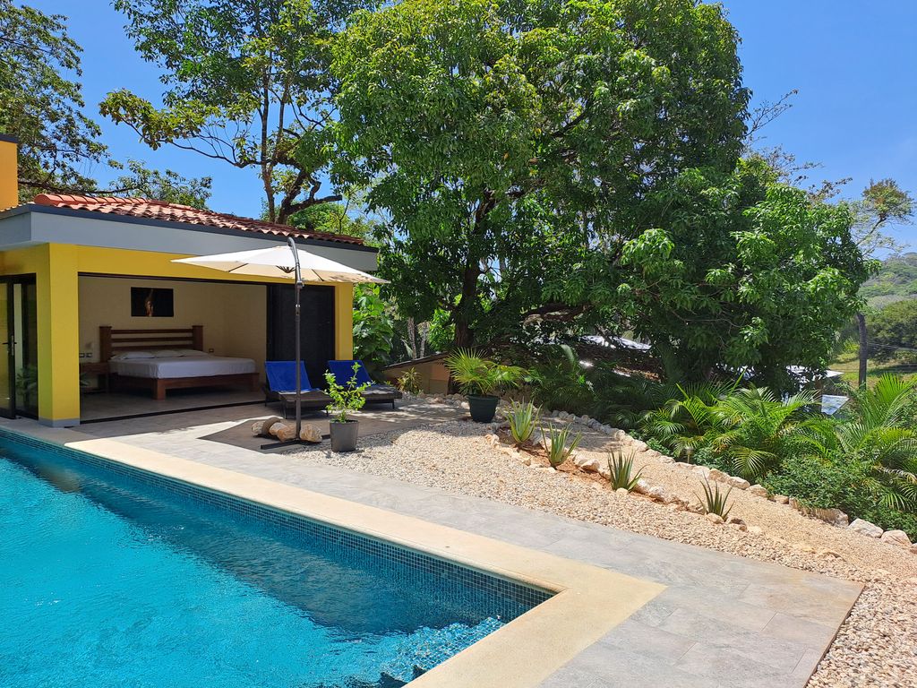 master bedroom and pool at Casa Ananda home for sale Carillo Beach samara costa rica