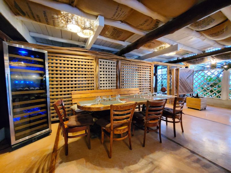 Large rustic table in Restaurant Gourmet Sol y Vino for sale Samara Costa Rica