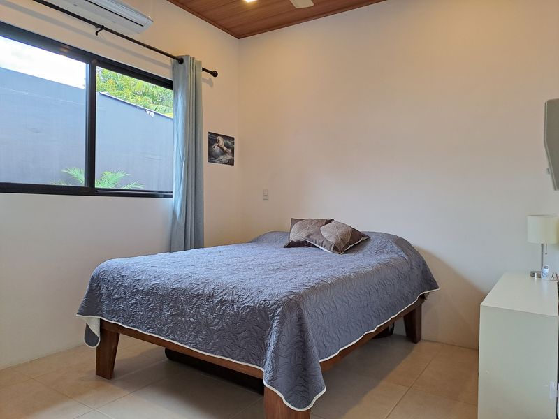 double bed with bed spread in Casa Nueva house for sale Samara Guanacaste Costa rica