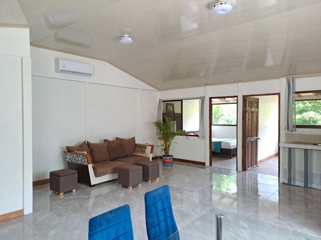 Lounge and dining area of Casa Verde house for sale at Samara, Guanacaste, Costa Rica
