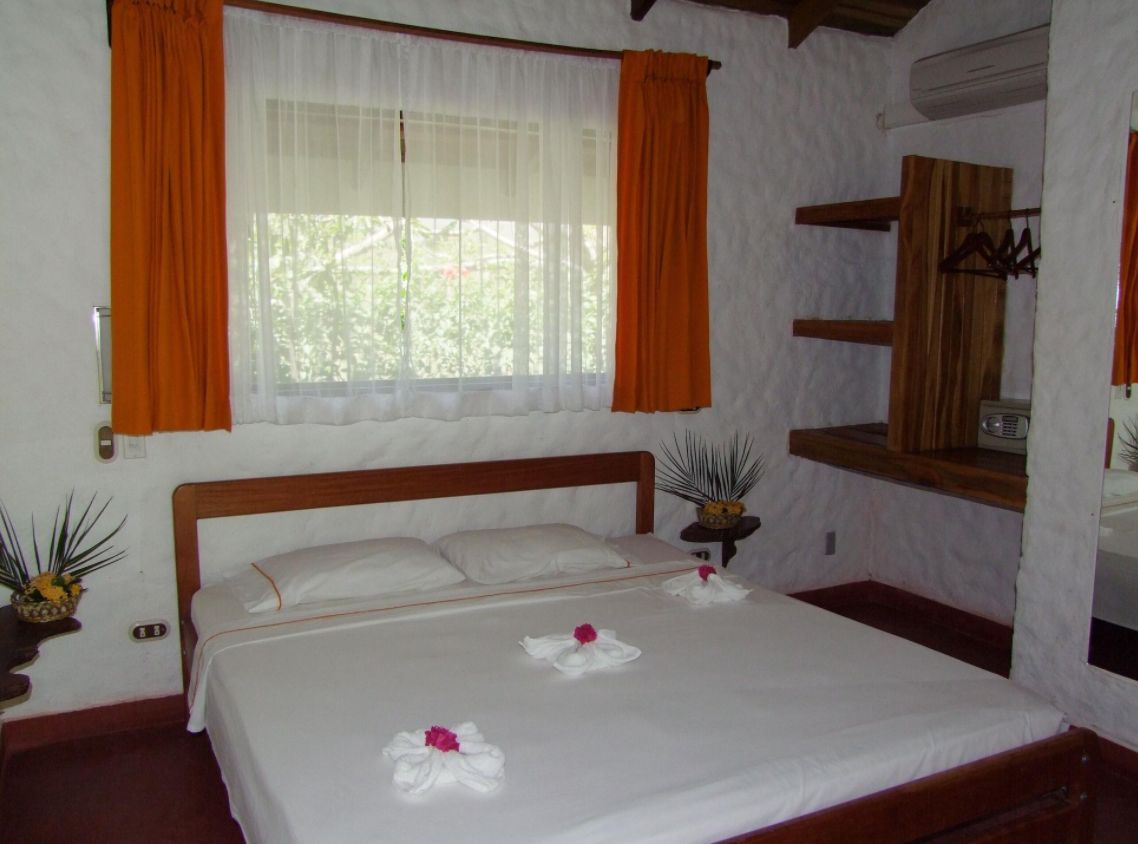 King size bed at Hotel Pacifico, business for sale at Samara Beach, Guanacaste, Costa Rica