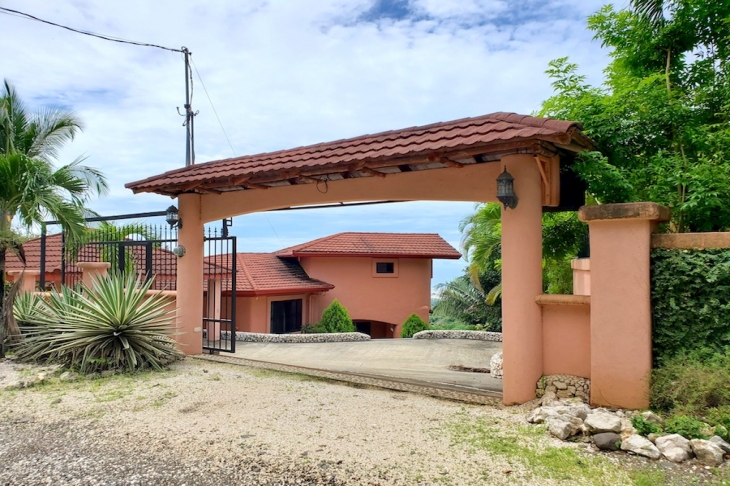 lovely spanish style gate of Villa Amanecer, house for sale at Carrillo Beach, Guanacaste, Costa Rica