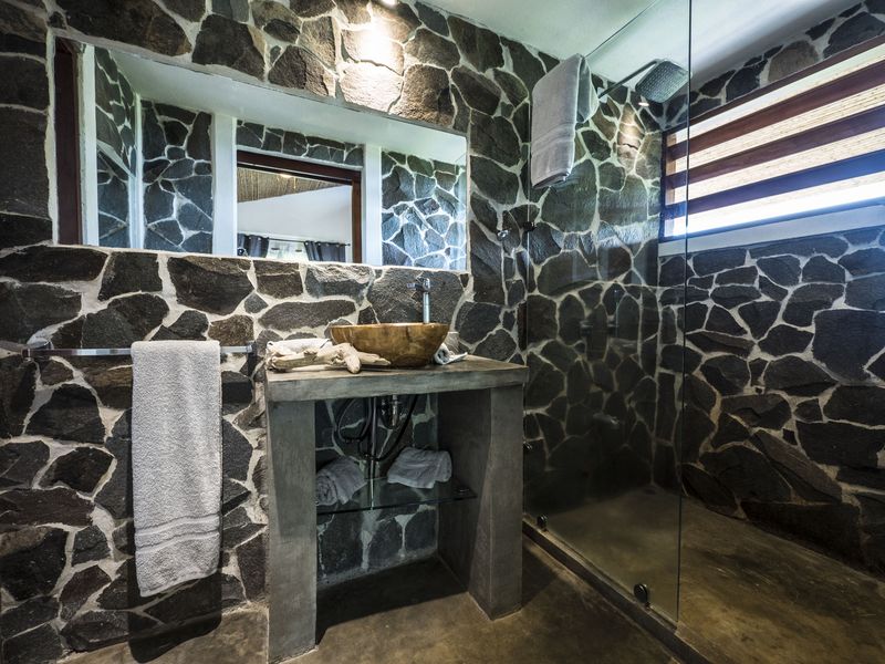 original stone bathroom at the Peaceful Retreat Hotel for sale at Carillo Beach Costa Rica