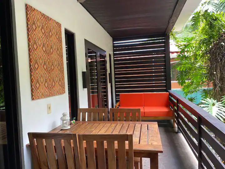 Outdoor terrace at The Urban Sanctuary Lodge hotel and rental income property, for sale at Samara Beach, Guanacaste, Costa Rica