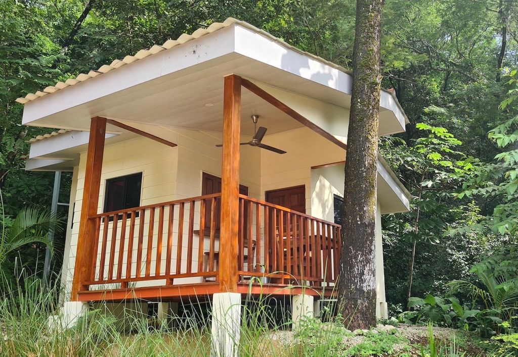 Beautiful yellow bungalow at Wild Life Lodge, rental income property, Hotels and businesses for Sale at Samara Beach, Costa Rica