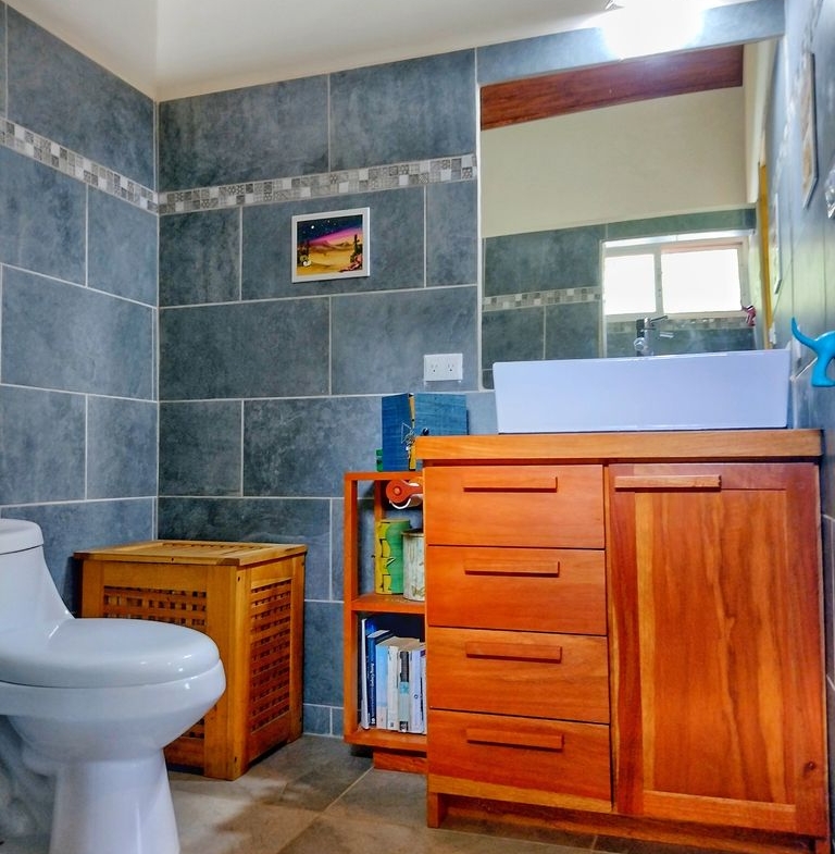 wooden furniture and sink in Casa ceiba hotel and rental income property for sale at Samara Beach Guanacaste Costa Rica
