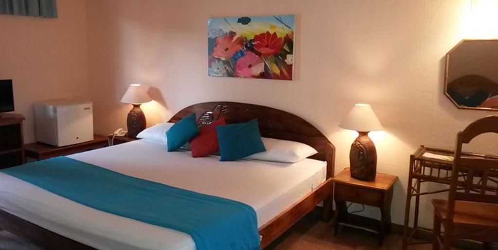 King size bedroom of Samara Central Hotel, business for sale at Samara Beach, Guanacaste, Costa Rica