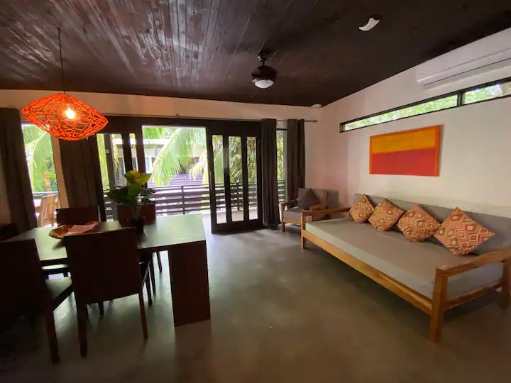 Nice lounge area at The Urban Sanctuary Lodge hotel and rental income property, for sale at Samara Beach, Guanacaste, Costa Rica