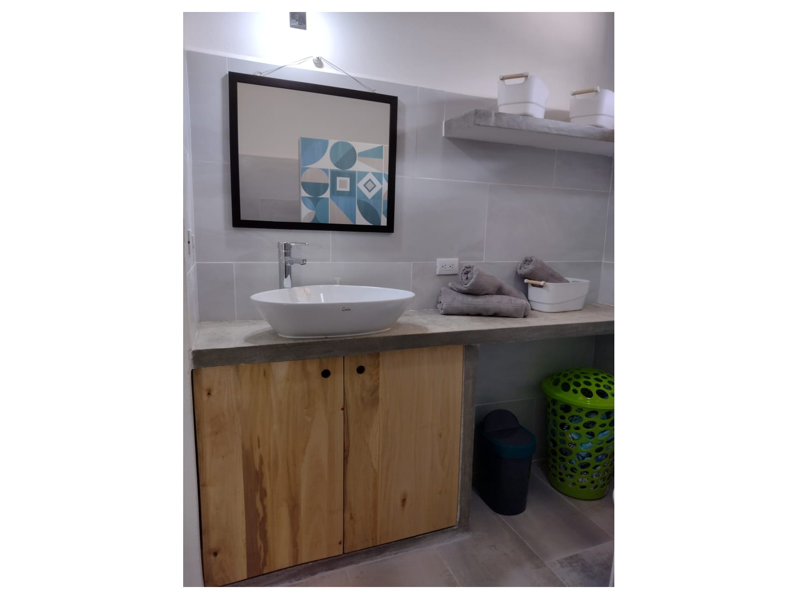 wooden furniture and white sink in Casa espinoza home for sale samara costa rica