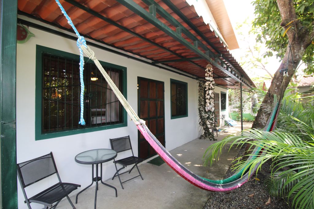 hammoc in garden of Casa Nela, hotel and rental income property for sale at Samara Beach, Guanacaste, Costa Rica