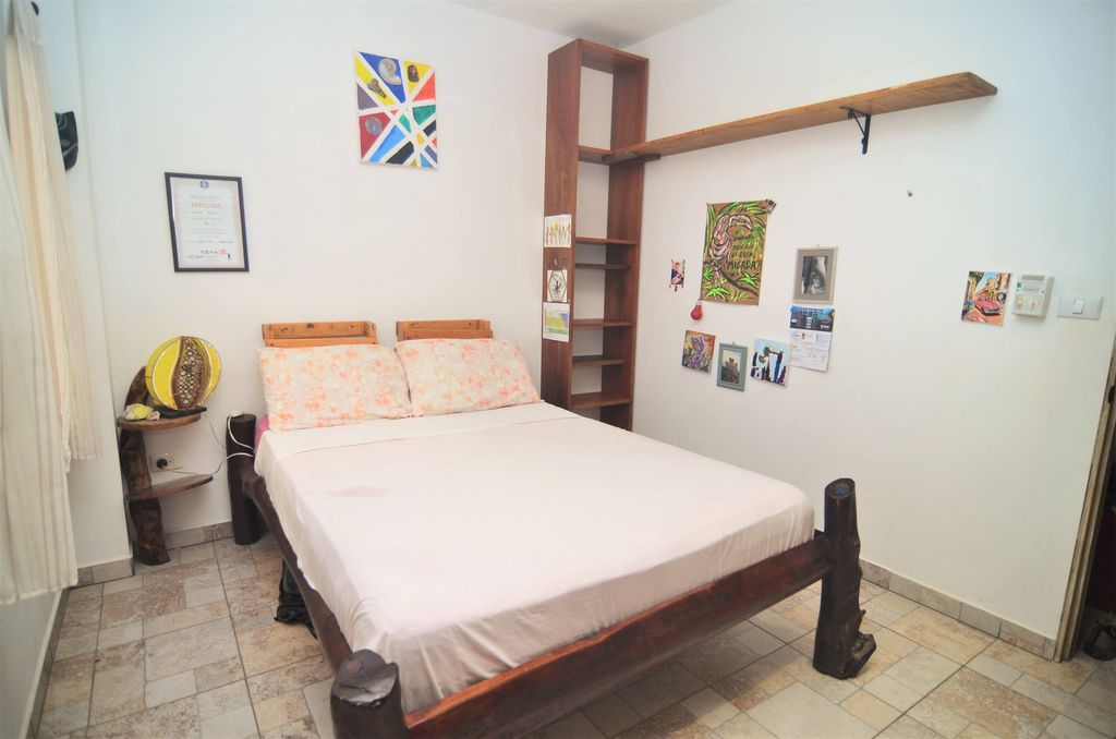 First bedroom at Casa La Isla, rental income property for sale at Samara Beach, Costa Rica