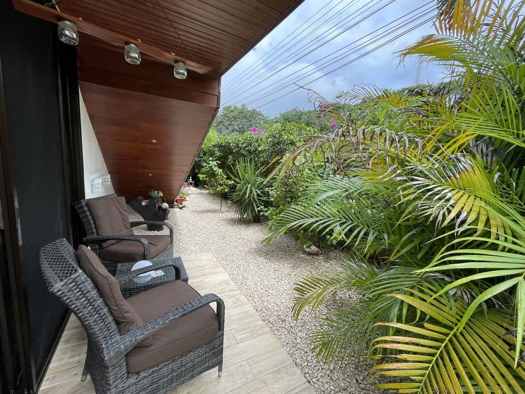 Lush vegetation of Relax Lodge hotel and rental income property, for sale atSamara Beach, Guanacaste, Costa Rica