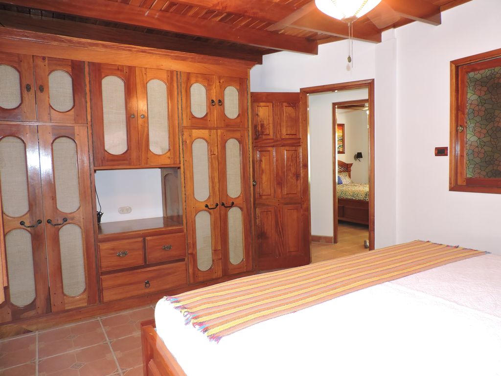 master bedroom with closet in Casa Mariposa, home for sale at Samara Beach, Guanacaste, Costa Rica