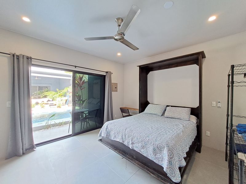 queen sized bed in guest house of Casa Nueva house for sale Samara Guanacaste Costa rica