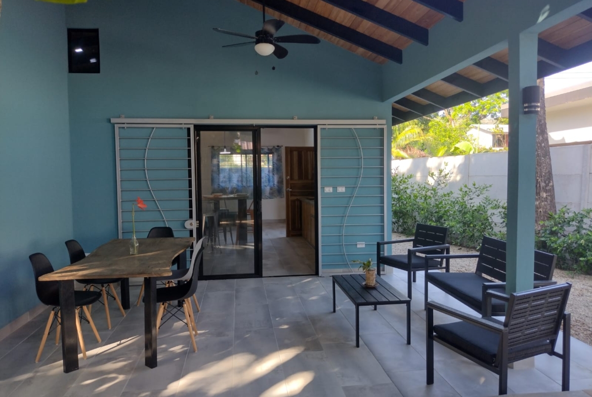 covered terrace with lounge area at Casa espinoza home for sale samara costa rica