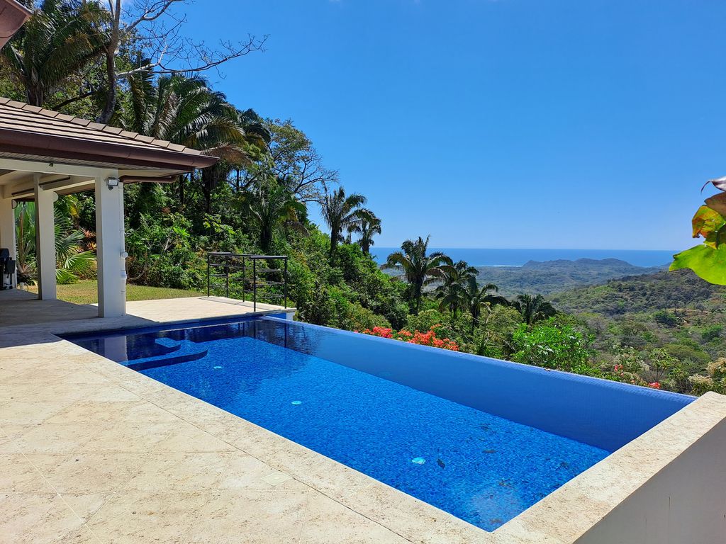 Pool and ocean view from Casa Tucancillo, home for sale at Samara Beach, Guanacaste, Costa Rica