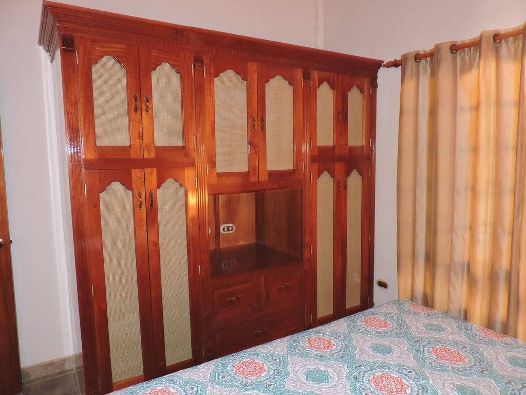 custom made wooden closet you can found in Casa Colibri, home for sale at Samara Beach, Guanacaste, Costa Rica