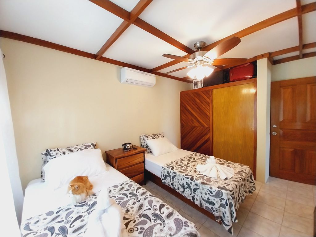 Double bedroom of Casa Bella Montaña, home for sale at Samara Beach, Guanacaste, Costa Rica