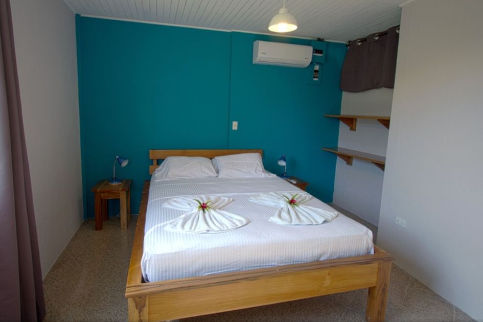 Blue single bedroom at Hotel Pacifico, business for sale at Samara Beach, Guanacaste, Costa Rica