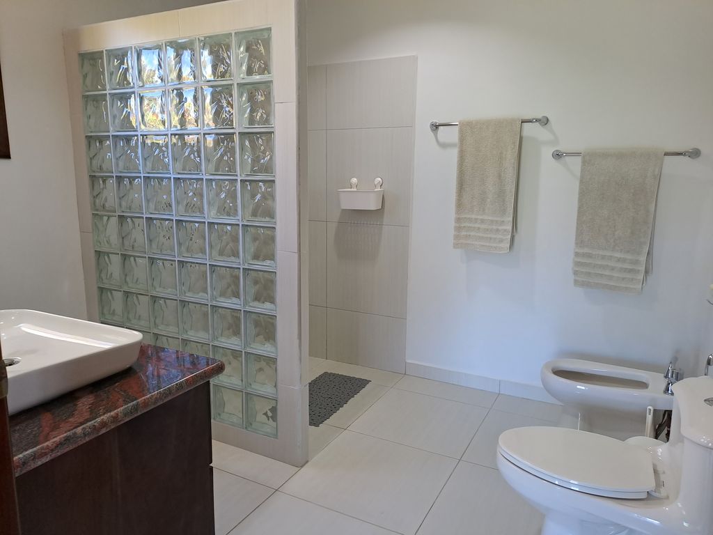 White bathroom of Casa Tucancillo, home for sale at Samara Beach, Guanacaste, Costa Rica