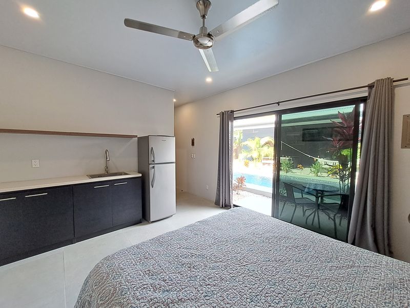 bed with kitchen in guest house of Casa Nueva house for sale Samara Guanacaste Costa rica