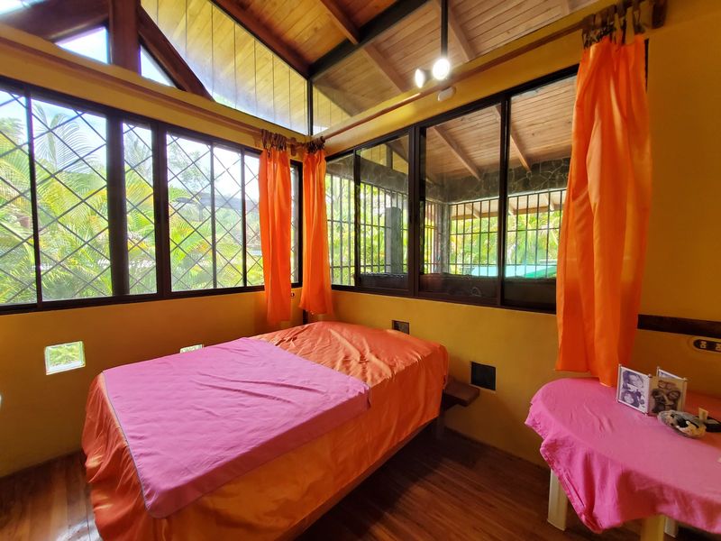 Colorfull bedroom of Casa Sol, house for sale at Samara, Guanacaste, Costa Rica
