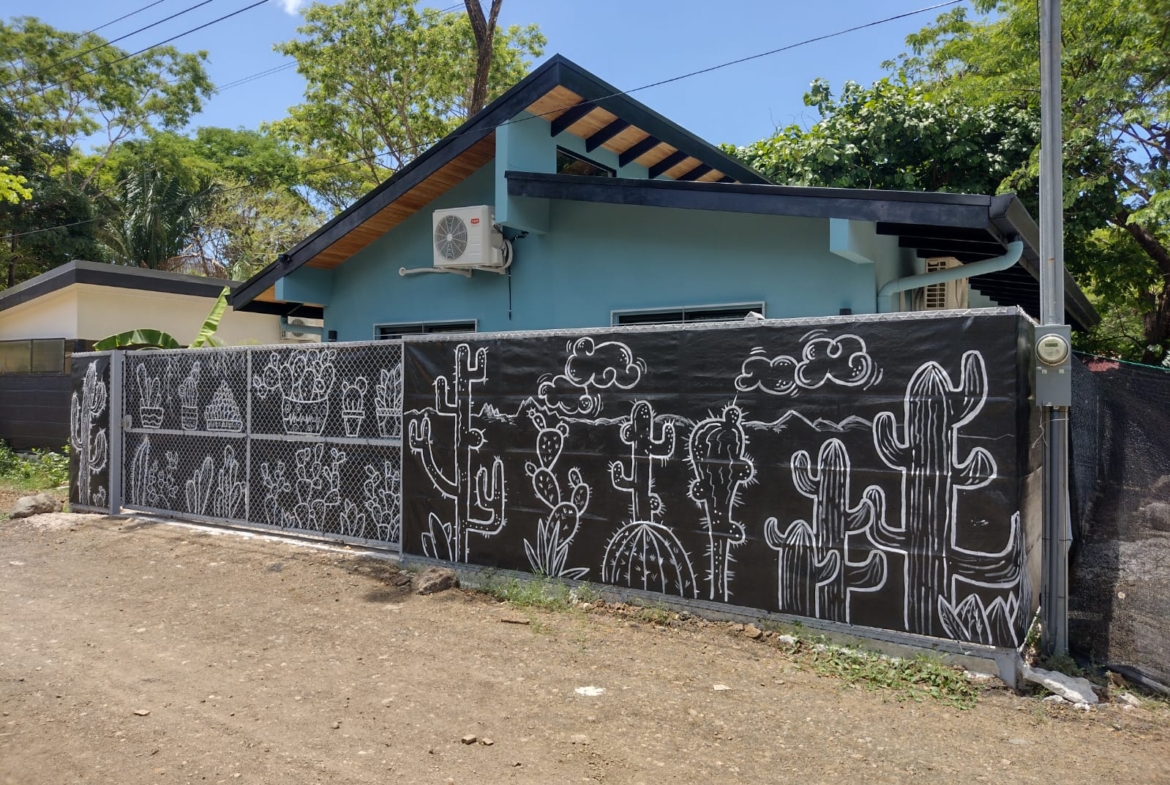 lovely painted fence of Casa espinoza home for sale samara costa rica
