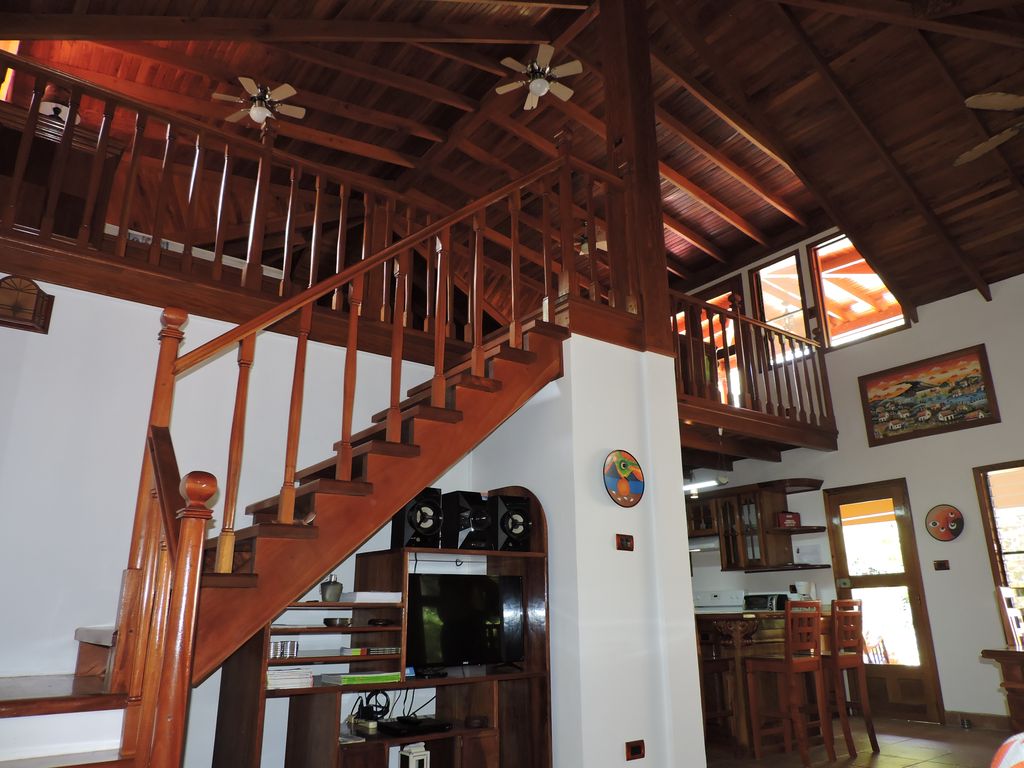 beautiful wooden staircases of Casa Mariposa, home for sale at Samara Beach, Guanacaste, Costa Rica