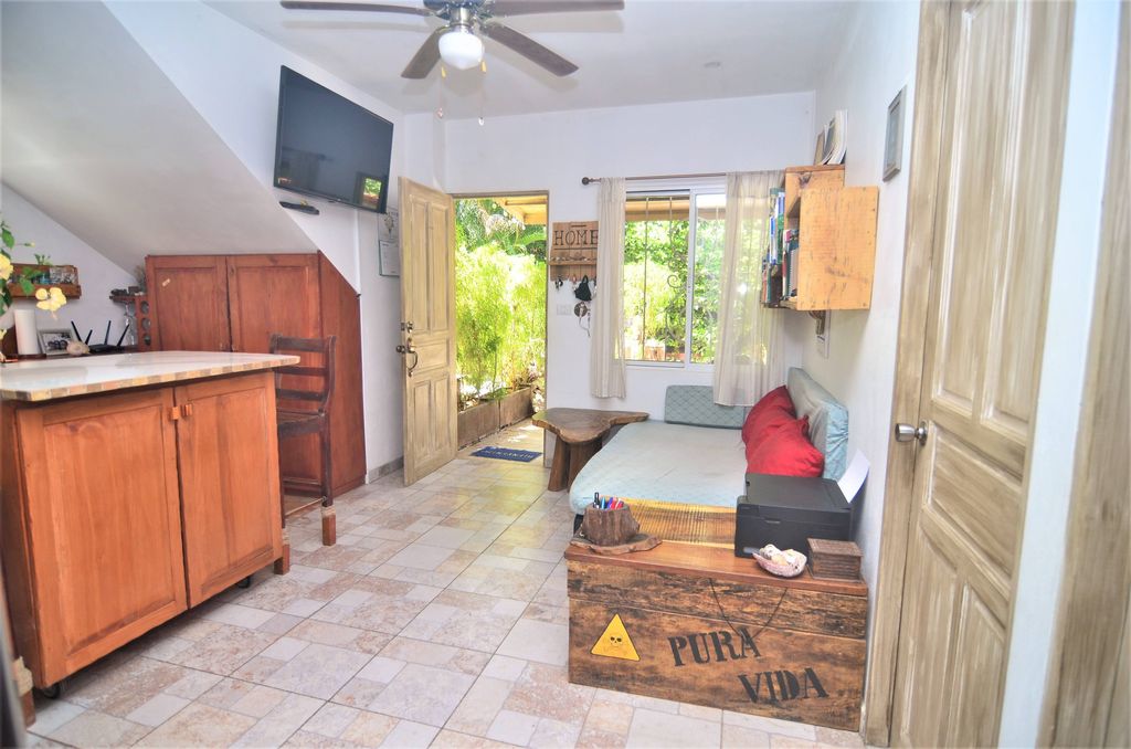 Living area at Casa La Isla, rental income property for sale at Samara Beach, Costa Rica