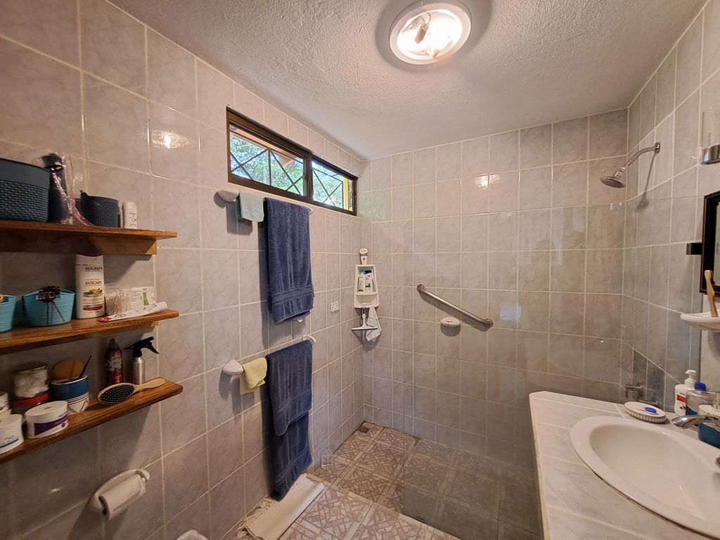 White bathroom of Casa Las Maracas, home for sale at Esterones close to Samara Beach, Guanacaste, Costa Rica