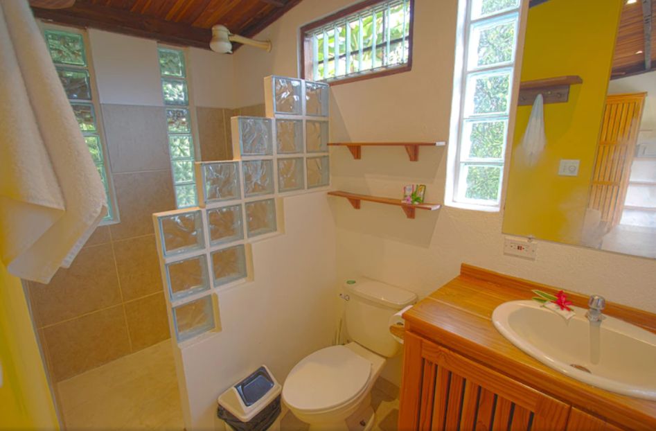 Yellow bathroom at Hotel Pacifico, business for sale at Samara Beach, Guanacaste, Costa Rica