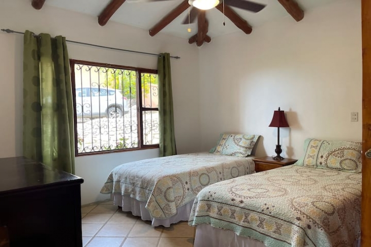 two single beds in bedroom of Villa Amanecer, house for sale at Carrillo Beach, Guanacaste, Costa Rica
