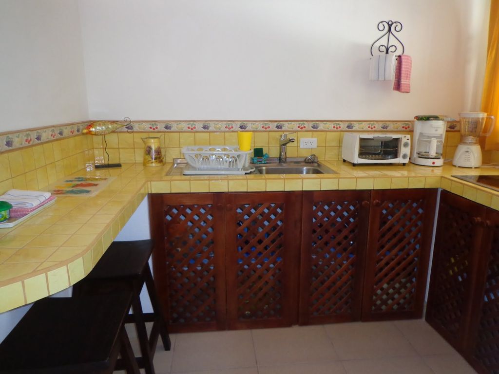 full equipped kitchen in studio at Villa Medina, house for sale at Samara Beach, Guanacaste, Costa Rica