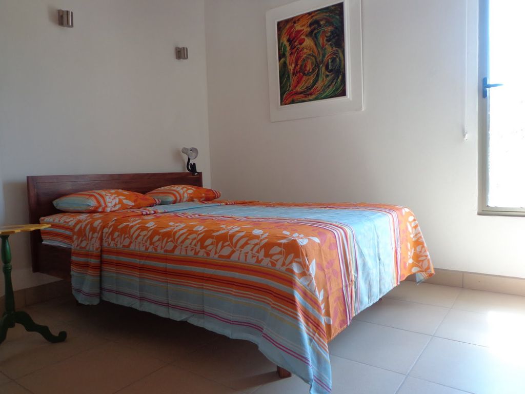 double bed in guesthouse of Villa Medina, house for sale at Samara Beach, Guanacaste, Costa Rica