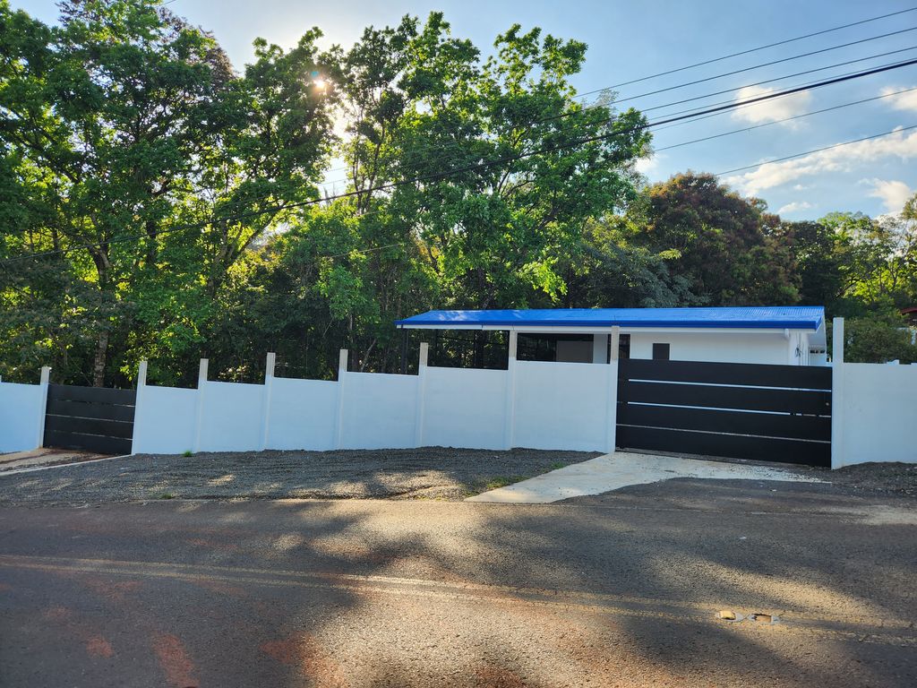 Main fence and gate of Casa Monalisa, home for sale at Estrada Carrillo Beach, Guanacaste, Costa Rcia