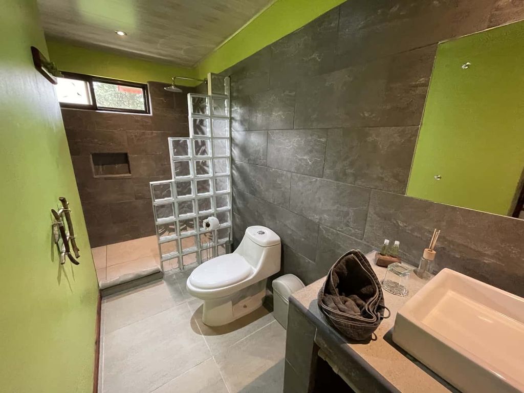 Modern toilet of Relax Lodge hotel and rental income property, for sale atSamara Beach, Guanacaste, Costa Rica