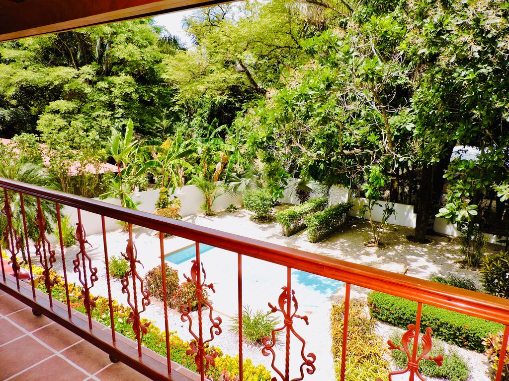 garden view from balcony at Casa Mariposa, home for sale at Samara Beach, Guanacaste, Costa Rica