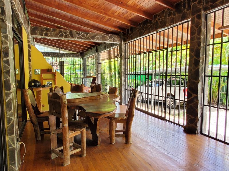 Covered wooden terrace of Casa Sol, house for sale at Samara, Guanacaste, Costa Rica