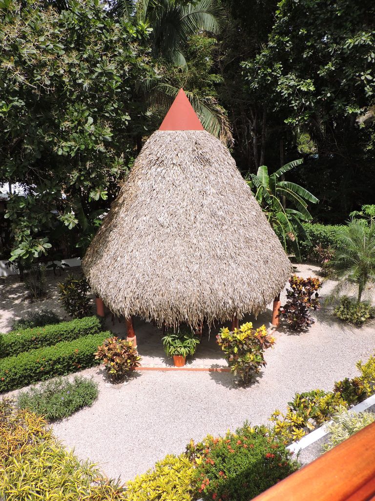 Palm Deck nestled in the tropical garden of Casa Mariposa, home for sale at Samara Beach, Guanacaste, Costa Rica