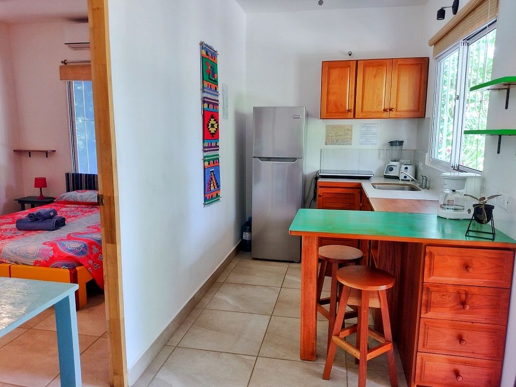 full equipped kitchen at Casa ceiba hotel and rental income property for sale at Samara Beach Guanacaste Costa Rica