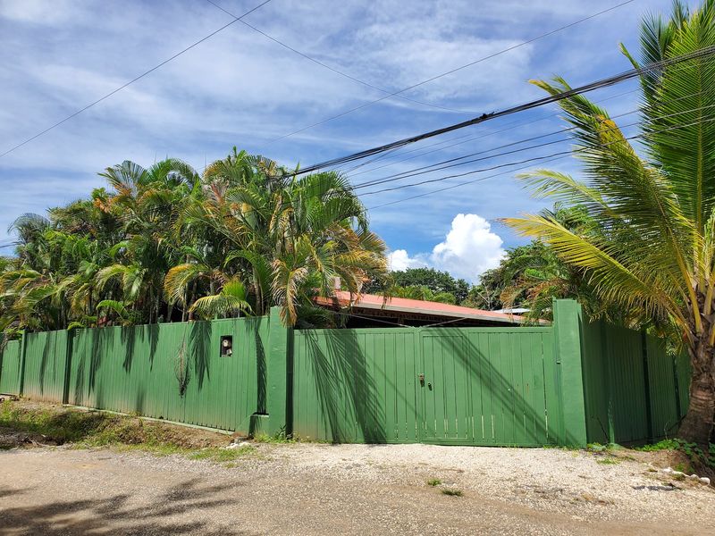 Green secure Metal Fence of Casa Sol house for sale Samara Guanacaste Cost Rica