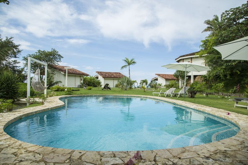 Main pool and his stone terrace at the Peaceful Retreat Hotel for sale at Carillo Beach Costa Rica