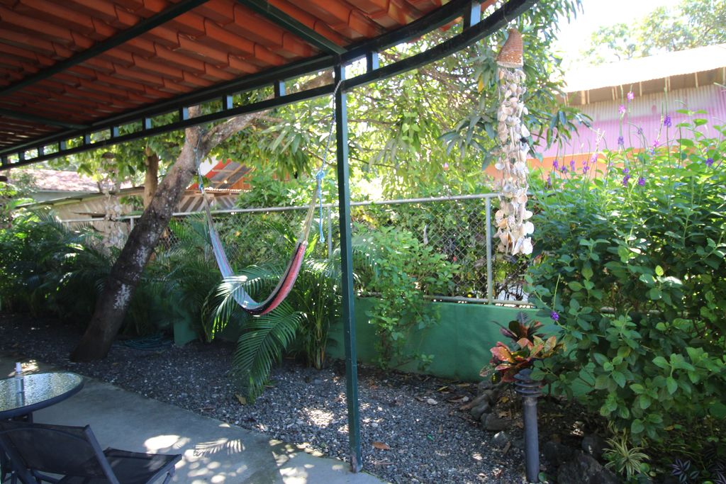tropical garden of Casa Nela, hotel and rental income property for sale at Samara Beach, Guanacaste, Costa Rica