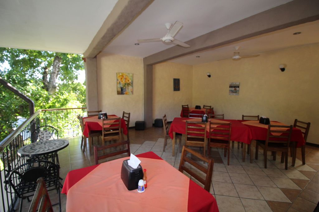 White ceiling with fans of Casa Emerald, Restaurant and Cabinas for sale at Samara Beach, Guanacaste, Costa rica